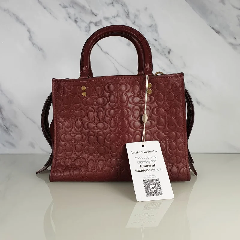 Coach handbags with a metal - framed clasp for durability and styleCoach Rogue 25 in Burgundy Signature Embossed Leather with Floral Bow Lining