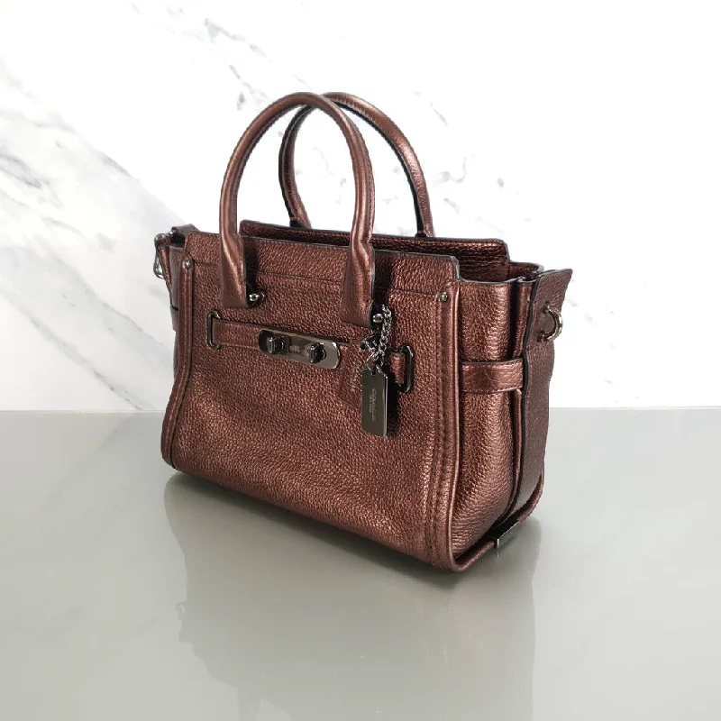 Coach bags with a front - flap pocket and a turnlock for a classic aestheticCoach Swagger 27 in Metallic Brown Bronze Pebble Leather Handbag