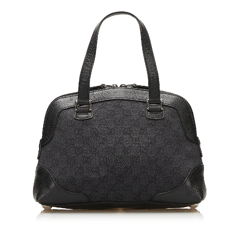 Women Gucci backpacks with a luxurious leather finishGucci GG Canvas Mini Dome Bag