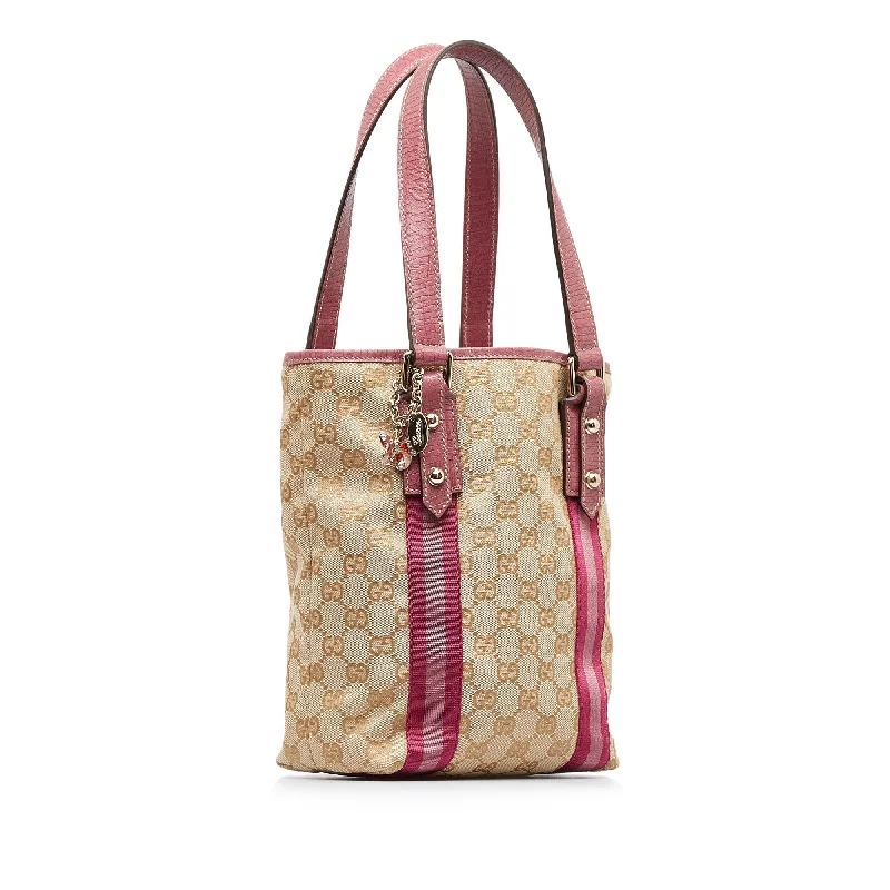 Gucci Marmont bags for women with gold - toned hardwareGucci GG Canvas Jolicoeur Tote Bag