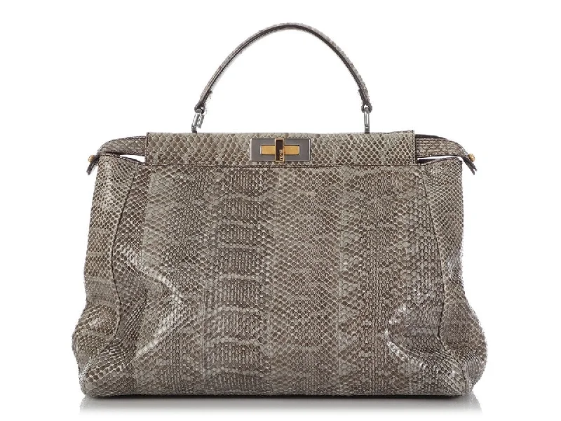 Fendi By The Way bags with a laser - cut leather detail for a modern and intricate lookFendi Large Python Peekaboo