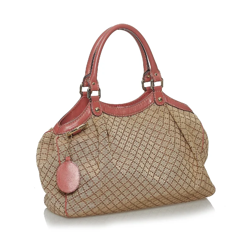 Women Gucci bags with a magnetic snap closure for easy accessGucci Diamante Sukey Canvas Tote Bag (28307)