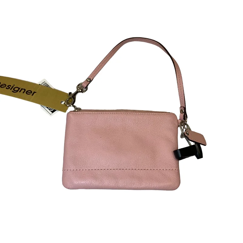 Ladies Coach shoulder bags with a magnetic - closure flap for easy accessWristlet Designer By Coach  Size: Small