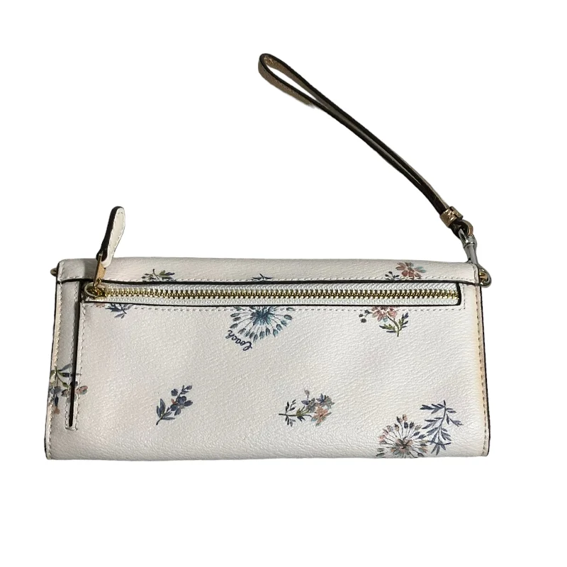 Coach Rogue bags with a detachable shoulder strap for versatile carryingWallet Designer By Coach  Size: Large