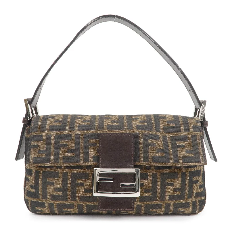 Ladies Fendi shoulder bags with a tassel - decorated zipper for added charm and styleFENDI Mamma Baguette Canvas Leather Shoulder Bag Brown Black 26424