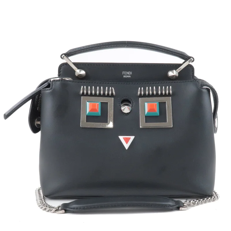 Fendi crossbody bags with a printed floral pattern for a feminine and romantic touchFENDI Leather Dotcom Monster Studs 2Way Bag Black 8BN299