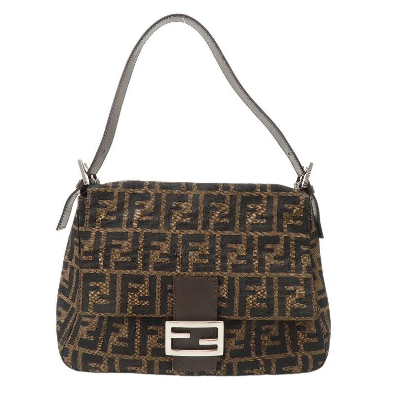 Fendi tote bags with a hand - painted FF pattern for an artisanal and one - of - a - kind touchFENDI Mamma Baguette Zucca Canvas Leather Bag Brown Black 26325