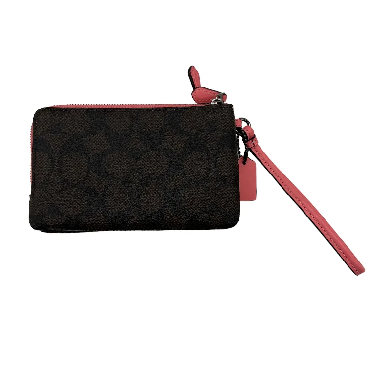 Ladies Coach Rogue bags with a star - shaped charm for a playful touchWallet Designer By Coach  Size: Medium