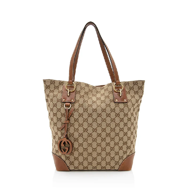 Women Gucci Sylvie bags with a detachable ribbon detailGucci GG Canvas Medium Charm Tote - FINAL SALE