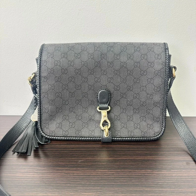 Women Gucci bags with a front - zip pocket for small itemsGucci GG Canvas Leather Crossbody Black Medium Size