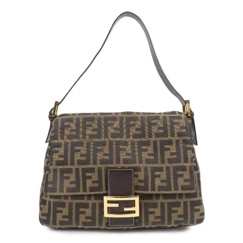 Fendi crossbody bags with a woven leather strap for a unique texture and visual appealFENDI Mamma Baguette Zucca Canvas Leather Shoulder Bag 26325