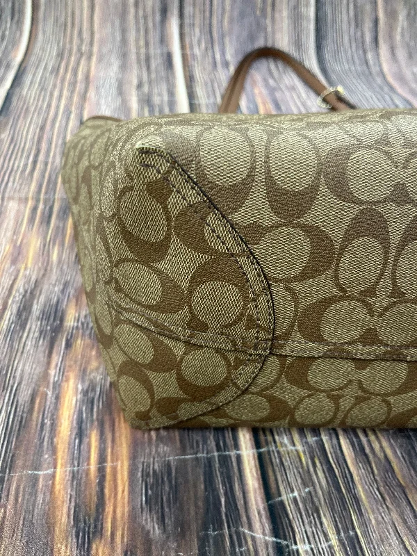 Coach Rogue bags with a monogram - embossed leather surfaceHandbag Designer By Coach  Size: Large