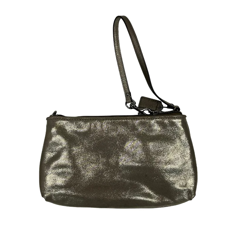 Ladies Coach Tabby bags with a detachable shoulder strapWristlet Designer By Coach  Size: Medium