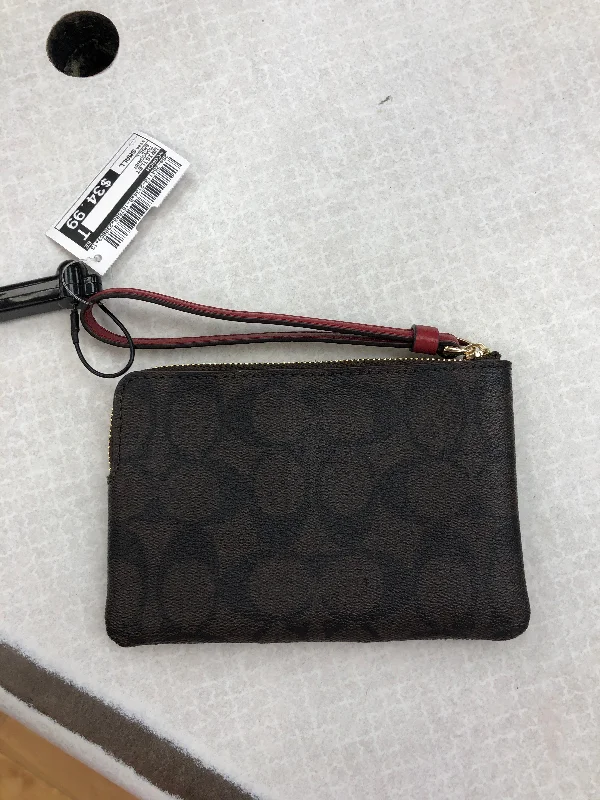 Coach Rogue bags featuring the signature C - hardware for a branded lookWristlet By Coach  Size: Small