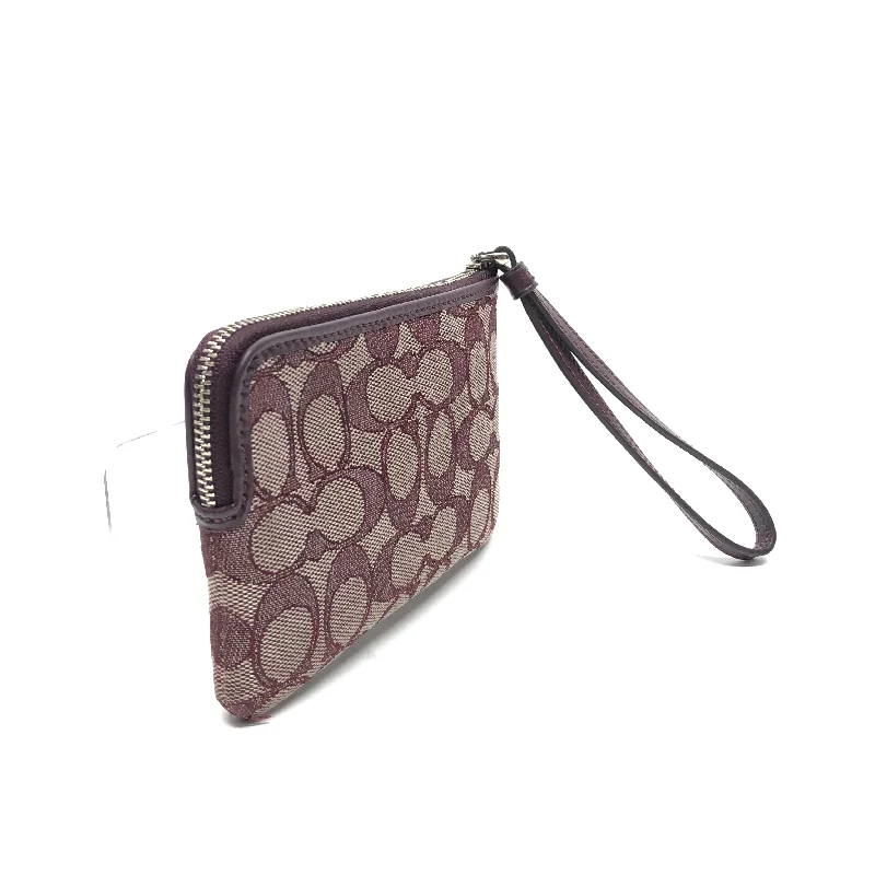 Coach handbags with a perforated leather detail for a breathable and unique designWristlet Designer By Coach  Size: Small