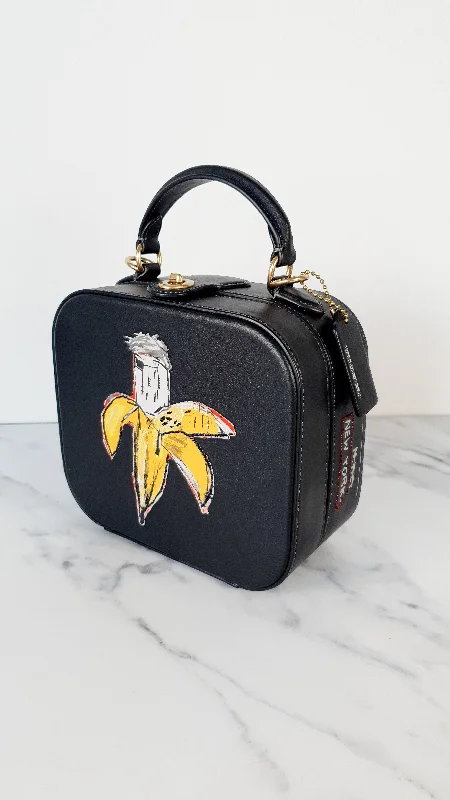 Ladies Coach Rogue bags with a star - shaped charm for a playful touchCoach x Jean-Michel Basquiat Square Bag with Banana artwork - Smooth Black Leather Crossbody Bag Handbag Coach 6898