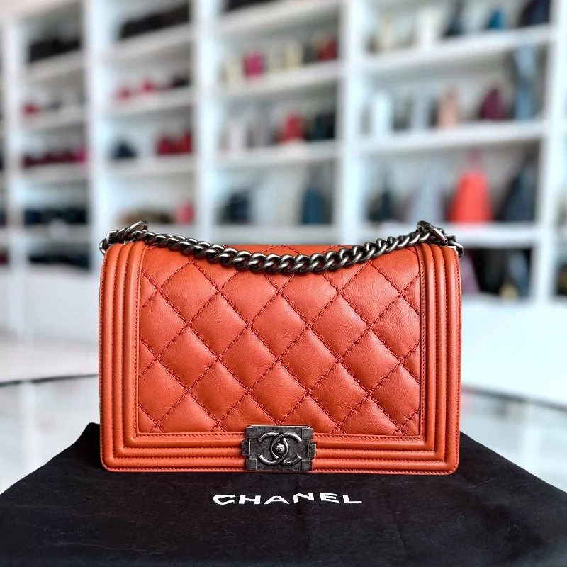 Chanel bags for a polished and professional appearanceBoy Calfskin New Medium 28CM Quilted Orange Leboy RSHW No 18