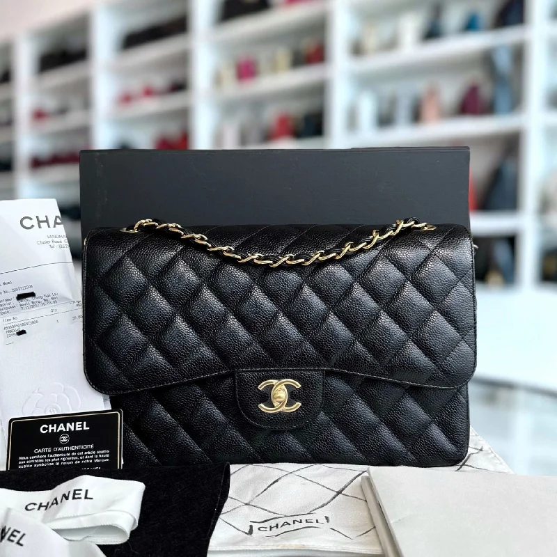 Chanel bags with gold, silver, and pearl accentsCaviar Double Flap Jumbo Classic Flap Black GHW No 23