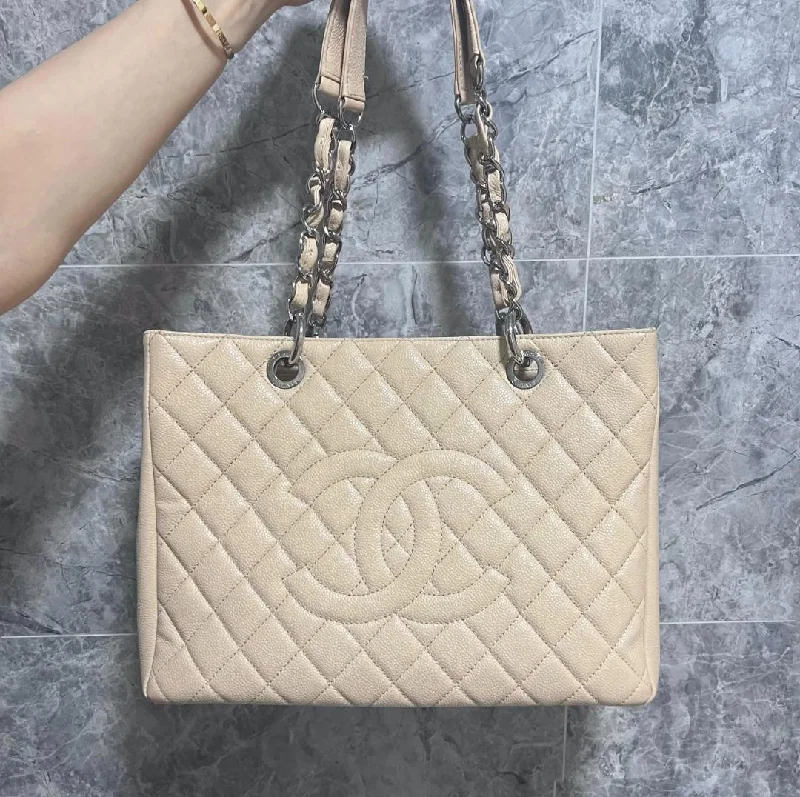 Chanel bags available at online luxury retaileGST Caviar Grand Shopping Tote Beige No 14