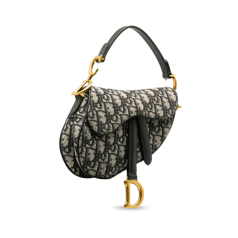 Christian Dior handbags with a snap - button closure and a decorative buckleDior Mini Oblique Saddle (FrUscU)