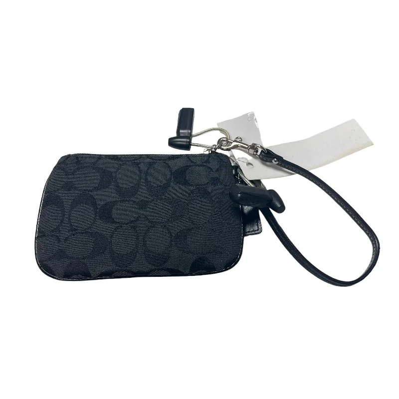 Coach Rogue bags featuring the signature C - hardware for a branded lookWristlet Designer By Coach  Size: Small